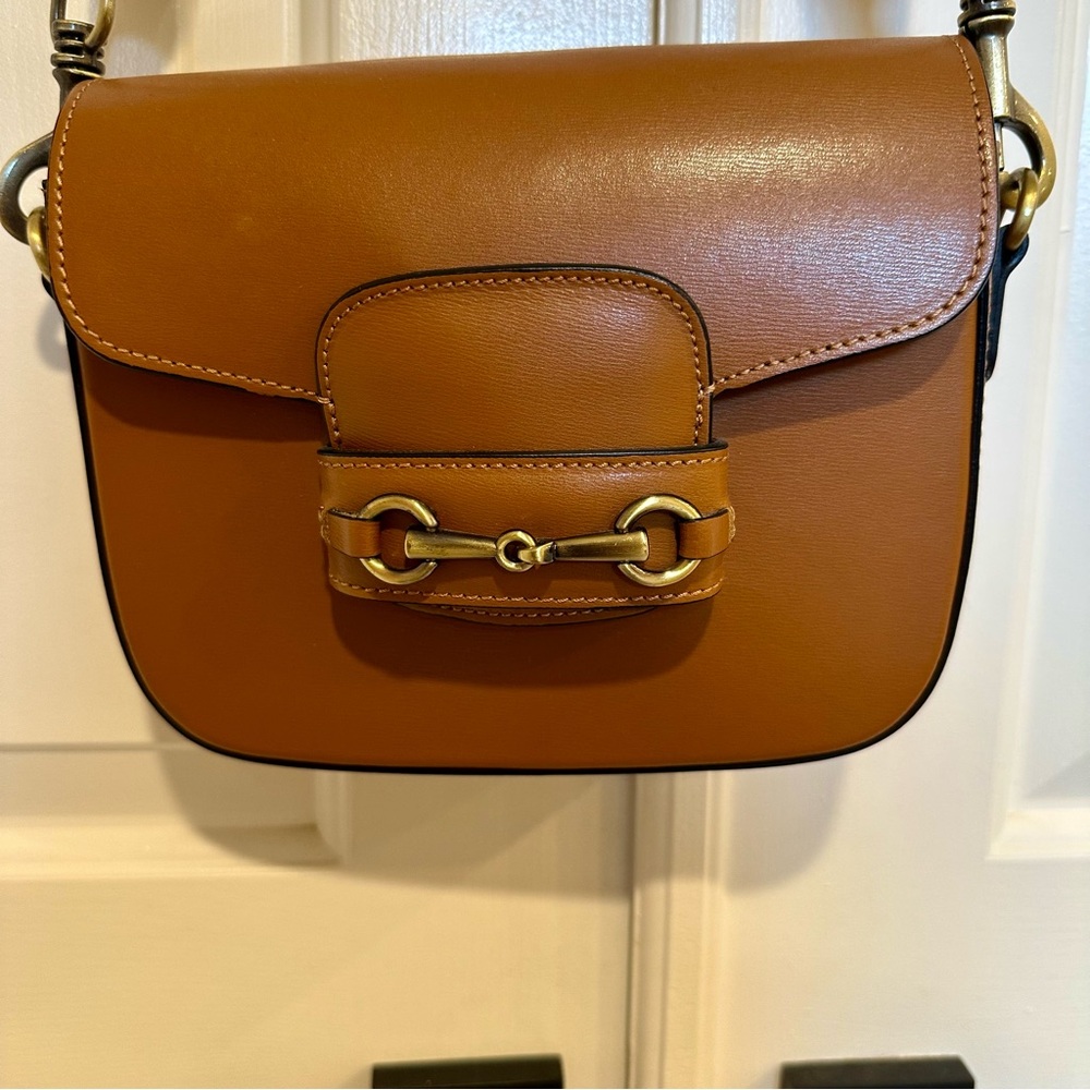 Horse Bit Purse PRODOTTO ARTIGIANALE
VERA PELLE
GENUINE LEATHER
MADE IN ITALY